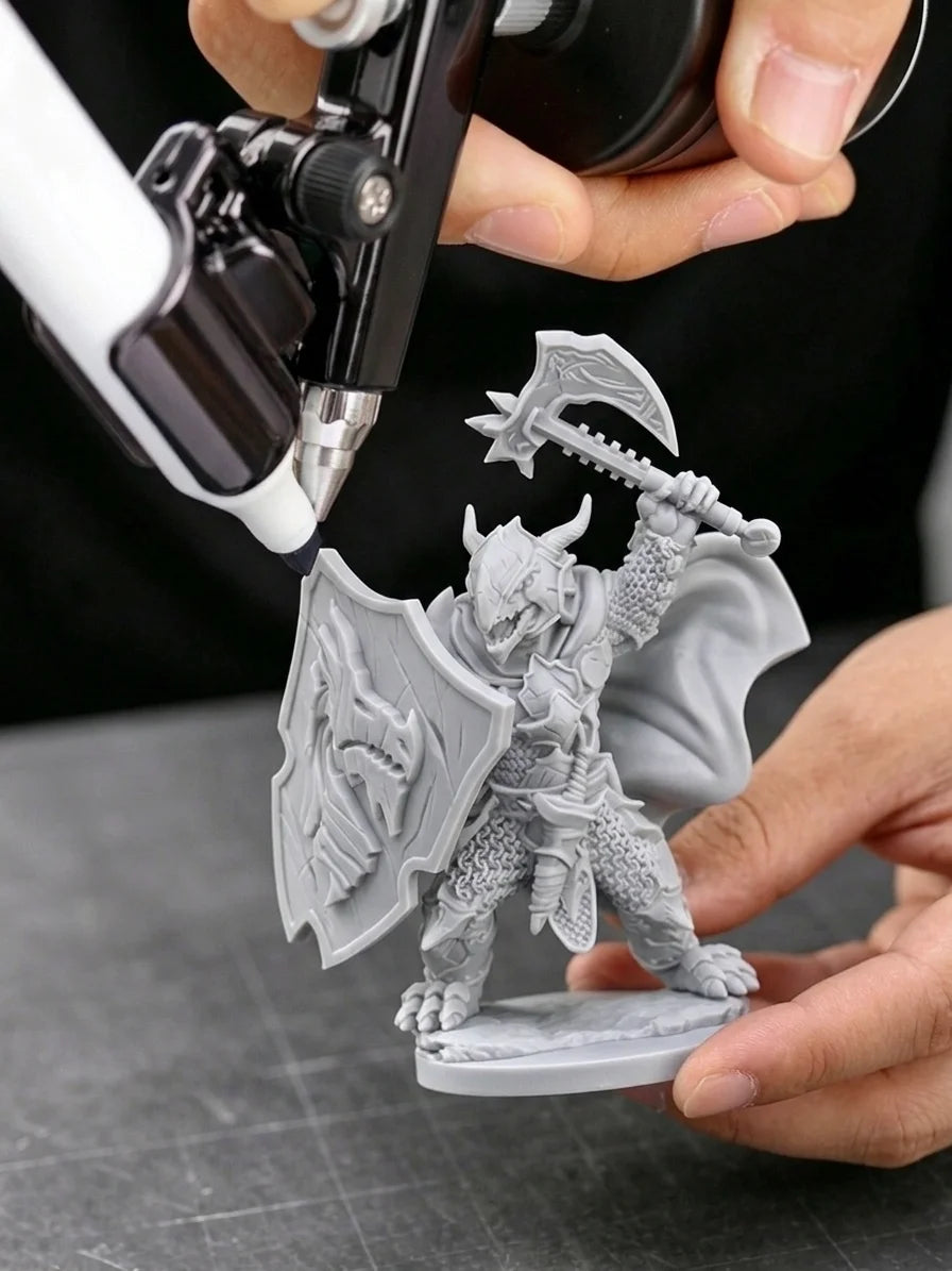Using a cordless marker airbrush to shade a 3D-printed dragon model